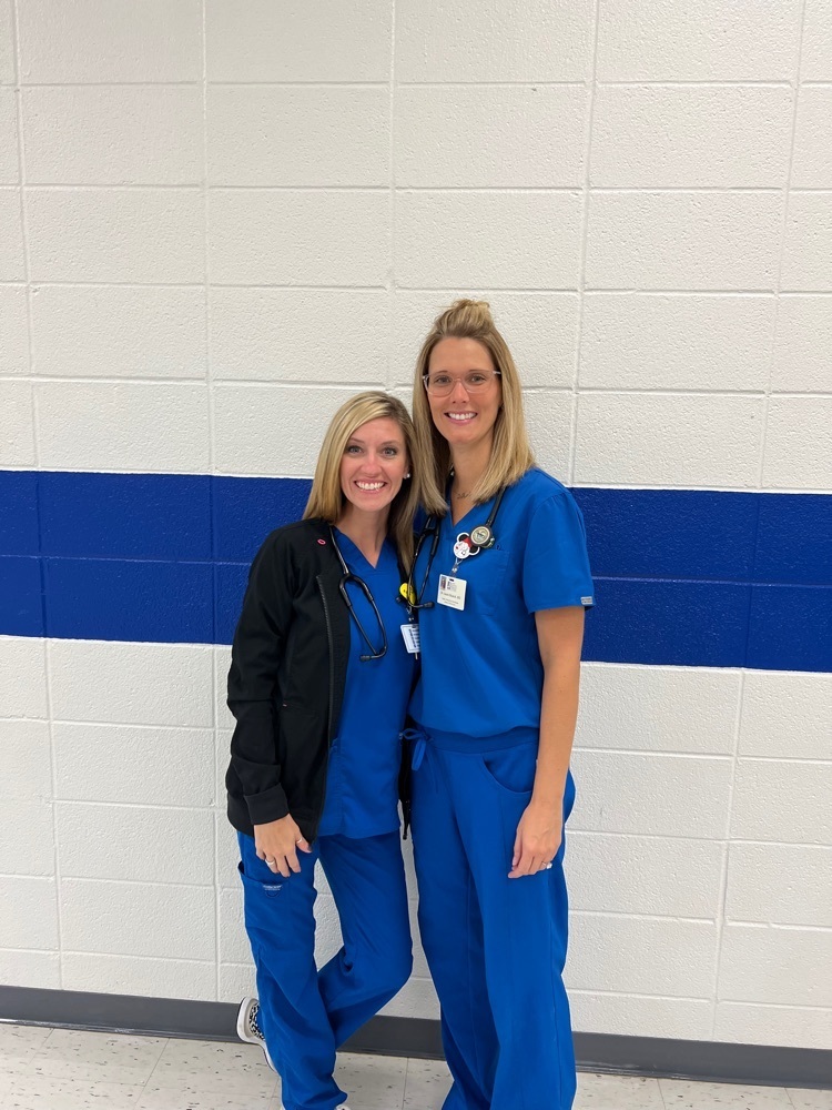 Dr. Glueck and Andrea at OR this morning for sports physicals  