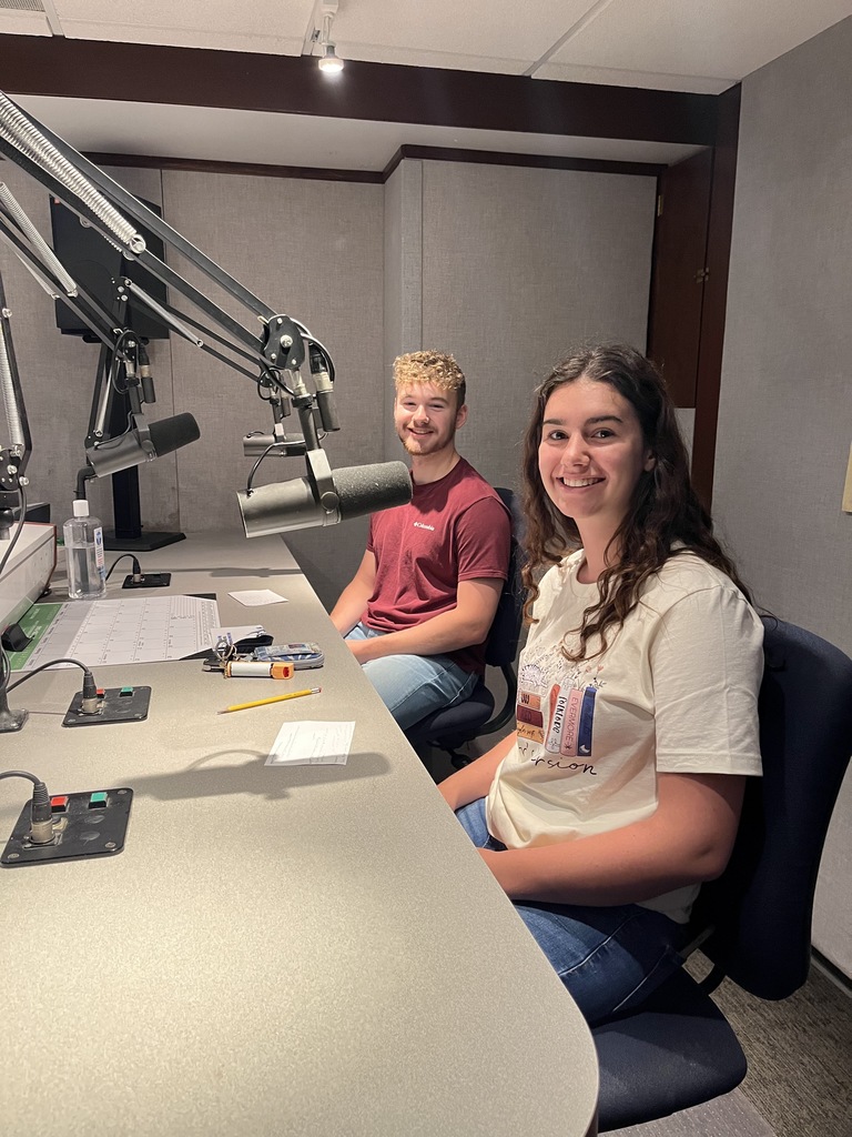 male & female student in radio studio